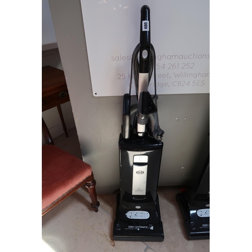 680 - A Sebo upright vacuum cleaner - in working order - retails around £500