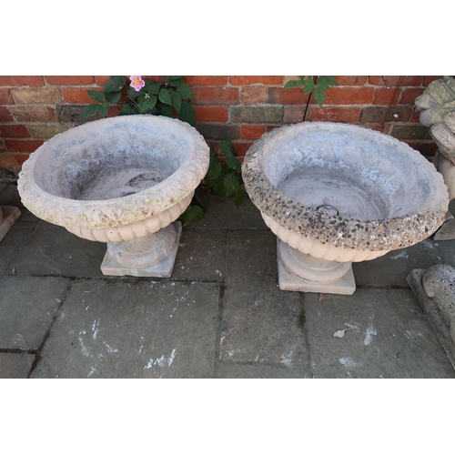 689 - A pair of garden planters on a plinth base - Width 60cm x Height 50cm