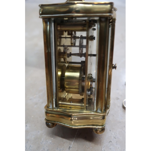 701 - A brass 8 day carriage clock