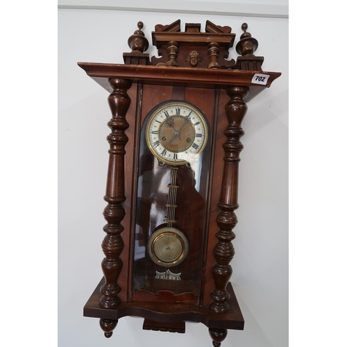 702 - An 8 day Vienna style striking wall clock