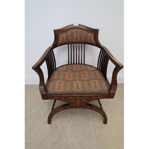 705 - An Edwardian mahogany and inlaid chair
