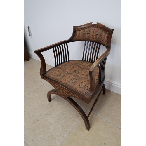 705 - An Edwardian mahogany and inlaid chair
