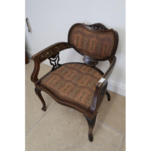 706 - An Edwardian mahogany and inlaid chair