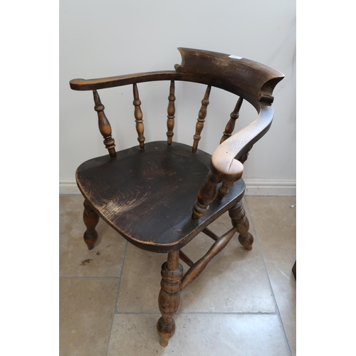 707 - A 19th century smokers bow armchair