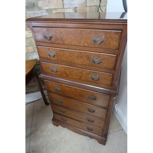 710 - An early 20th century walnut seven drawer chest - Width 59cm x Depth 36cm x Height 114cm