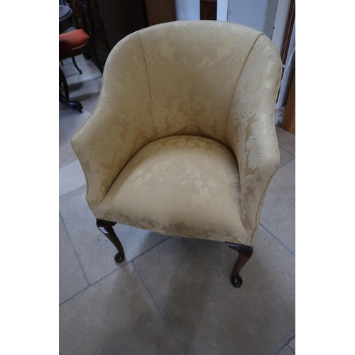 720 - A 1950's upholstered armchair and cushion