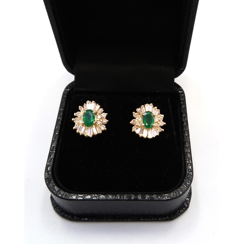 80 - A pair of 18ct Yellow Gold (Tested) Designer Emerald and Diamond Ear Rings with 9ct Yellow Gold Butt... 