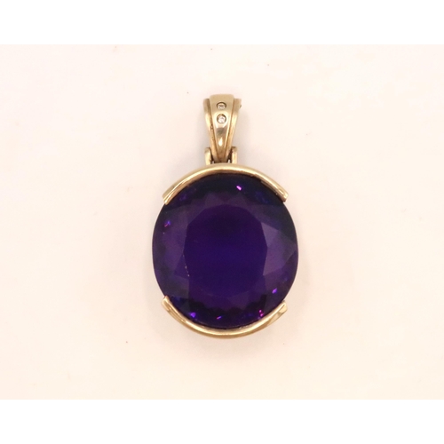 87 - A 9ct yellow gold amethyst pendant, amethyst approx 26mm x 24mm x 11mm, good condition