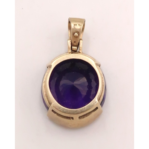 87 - A 9ct yellow gold amethyst pendant, amethyst approx 26mm x 24mm x 11mm, good condition