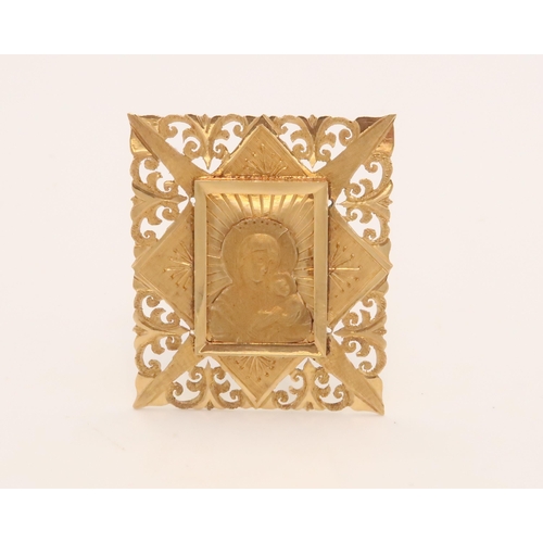 99 - An 18ct Tested Madonna & Child Pendant with stand, featuring an elaborately worked border. 

Stamped... 