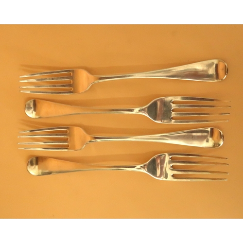 374 - A group of four Georgian silver forks, of simple upturned form, George Cowles, London 1803, 6.60toz.