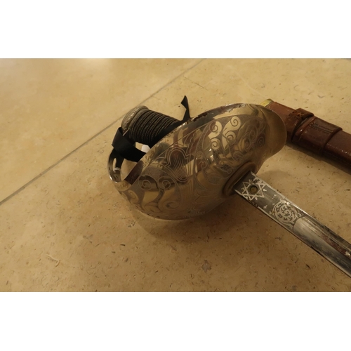 453 - A WWI infantry 1897 pattern dress sword, for the Norfolk Yeomanry, inscribed to the grip 'Presented ... 