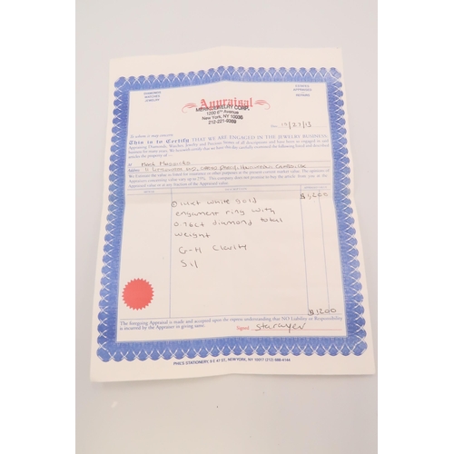 98 - A 14ct white gold, and diamond ring the central diamond of approximately 4.3mm diameter, 0.3ct with ... 