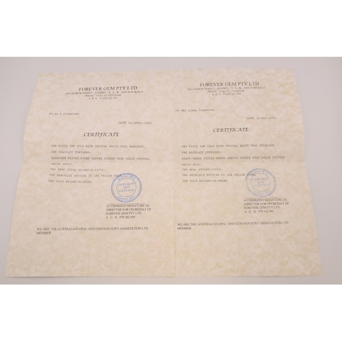 90 - An 18ct gold and Australian opal suite of jewellery comprising necklace and bracelet set with fourty... 