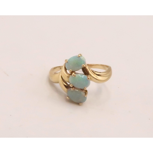 91 - An 18ct gold and opal three stone ring, the opals set in organic fanned form, of good colour and mov... 