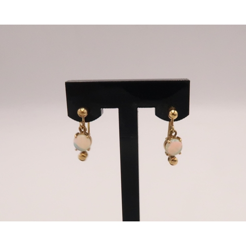 92 - A pair of 9ct gold and opal drop earrings, the opals with excellent colour and play, likely Australi... 