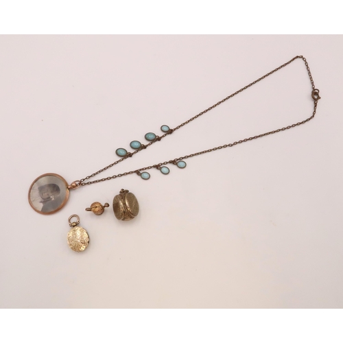 96 - Three pendant/charms, to include a photo locket charm comprising of three double photo panels. A sin... 