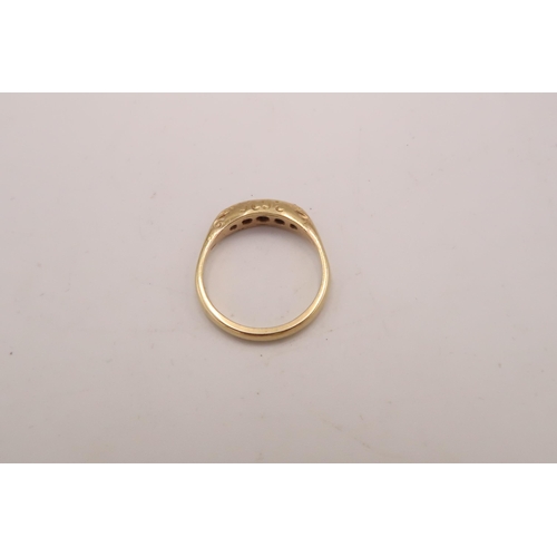 97 - A ruby and diamond boat shape ring. Tests gold 18ct. Size Q. Weight 3.03 grams