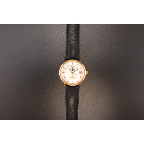 An Exceptionally rare 1960's 18ct Omega Seamaster, Automatic. Featuring the portrait of Sheikh Isa Bin Salman Al Khalifa, White dial, Gold Hands & hour markers. 34mm, with box. 

According to the vendor, this watch was gifted to her father who was a Senior air steward operating on the flight which the Sheikh was on. Rarely seen on the open market. 

Condition: The watch, strap and box are in very good condition and has been kept well. The watch runs and winds keeping time during periods of observation.