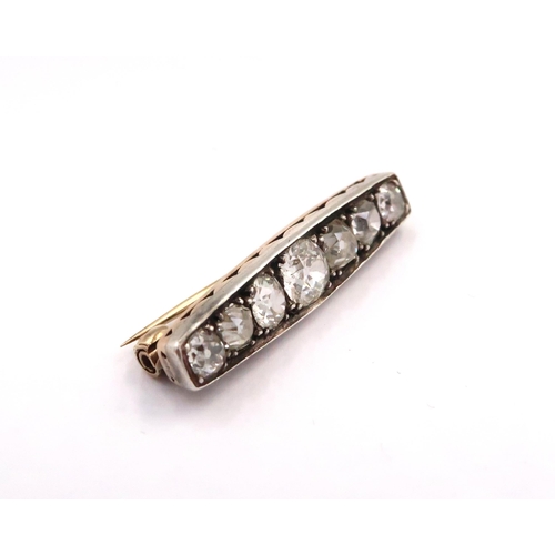 10 - An Edwardian Platinum & 14ct Seven Old Cut Diamond brooch, Approximately 2.0ct

Uhnallmarked, tests ... 