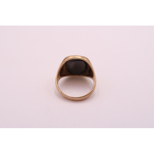 29 - A 9ct Gold Hematite Intaglio carved ring. 

Weight: 10.3 Size: U

Condition : Overall ring is in goo... 