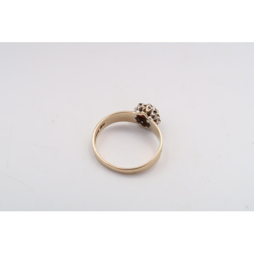 33 - A 9ct Garnet & White stone cluster ring. 

Weight: 2.6g Size: O