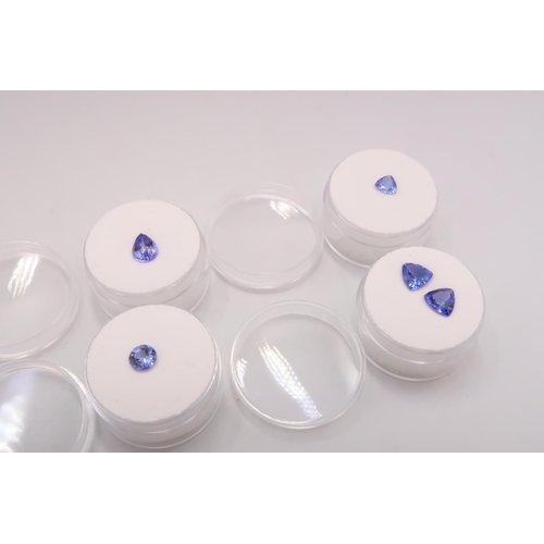 49 - A group of seven loose tanzanite gemstones. To include a circular faceted 0.71ct. A pair of circular... 