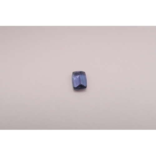 50 - A cushion cut tanzanite. With GIA certificate stating 4.96cts