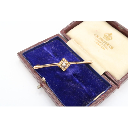 55 - A late Victorian or Edwardian seed pearl bar brooch, 49.4mm long, apparently unmarked but testing as... 