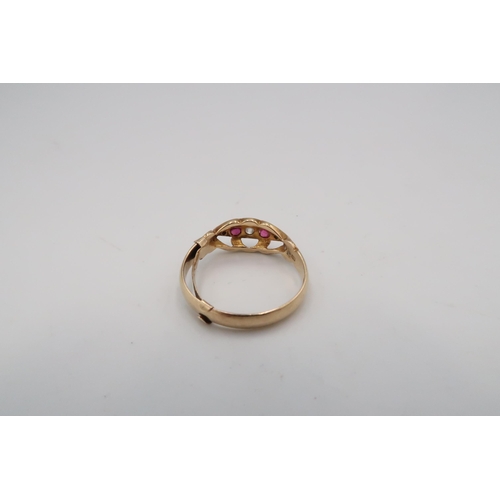 56 - An 18ct gold ruby and old cut diamond dress ring. Size Q 1/2. Weight 3.08 grams