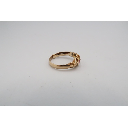 56 - An 18ct gold ruby and old cut diamond dress ring. Size Q 1/2. Weight 3.08 grams