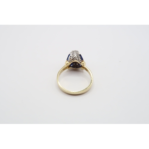 2 - An 18ct Gold Sapphire & Diamond ring, head individually set with tapered baguette sapphires with rou... 