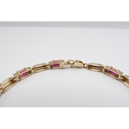 4 - A 9ct Ruby & Diamond Line bracelet. 

Weight: 7g Length: 18cm/7inches 

Condition: In good order, st... 