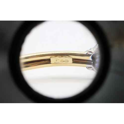 1 - An 18ct Gold Sapphire & Diamond Torque, ends individually set with tapered baguette sapphires with r... 