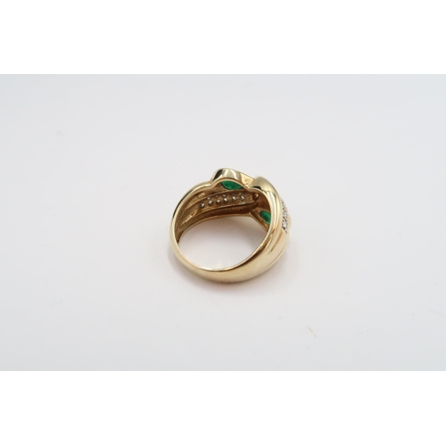 19 - A 14ct pear shape emerald and brilliant cut diamond crossover style ring. Size M 1/2. Weight 8.71 gr... 