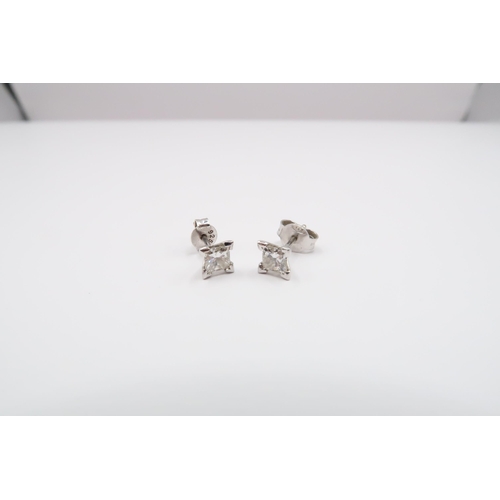 3 - A Pair of 18ct Diamond princess cut studs, 0.70ct Estimated total carat weight. 

Condition: Stones ... 