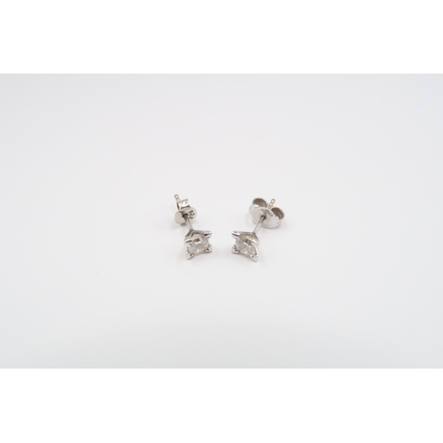 3 - A Pair of 18ct Diamond princess cut studs, 0.70ct Estimated total carat weight. 

Condition: Stones ... 