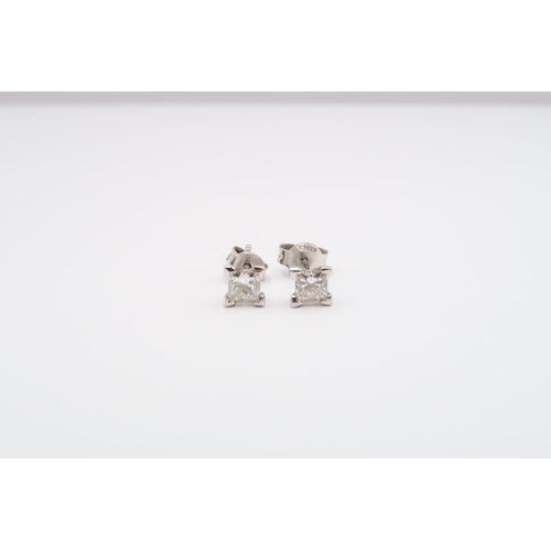 3 - A Pair of 18ct Diamond princess cut studs, 0.70ct Estimated total carat weight. 

Condition: Stones ... 