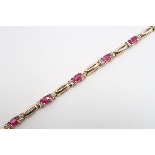 4 - A 9ct Ruby & Diamond Line bracelet. 

Weight: 7g Length: 18cm/7inches 

Condition: In good order, st... 