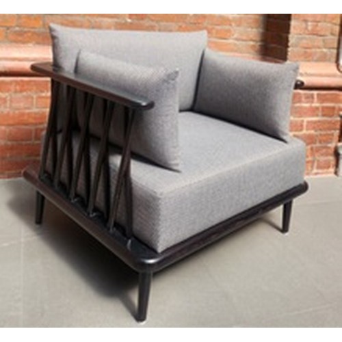 A pair of Nature Lounge armchairs in beechwood upholstered in Panaz ...