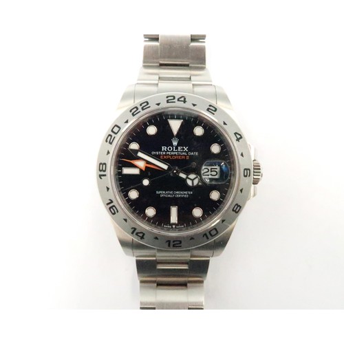 A 2022 Rolex Oyster Perpetual date Explorer II stainless steel bracelet gentleman's wristwatch with black dial and 24 hour bezel, 44mm including button - as new Model 226570, serial 07KV665 with box, tag, paperwork, outer box -