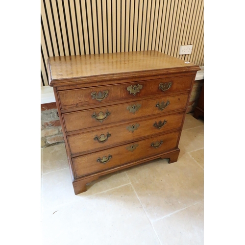 635 - A good quality 18th century oak chest with four graduating drawers on bracket feet and brass handles... 