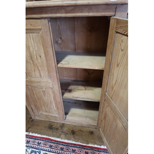 640 - A 19th century pine two door cupboard - Width 95cm x Height 125cm x Depth 34cm