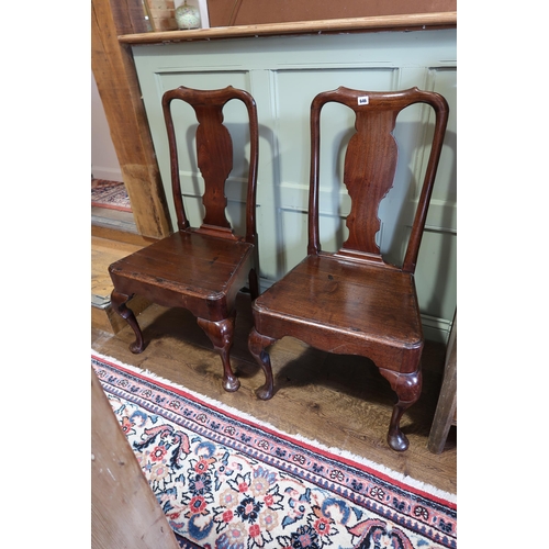 646 - A pair of mahogany chairs on cabriole legs