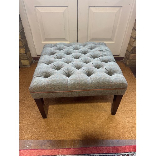 643 - A Harris Tweed covered footstool - as new - 63cm square