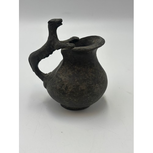426 - A Leaded Bronze Roman Style 'Grand Tour' Bronze Askos. 

Size: 7cm High