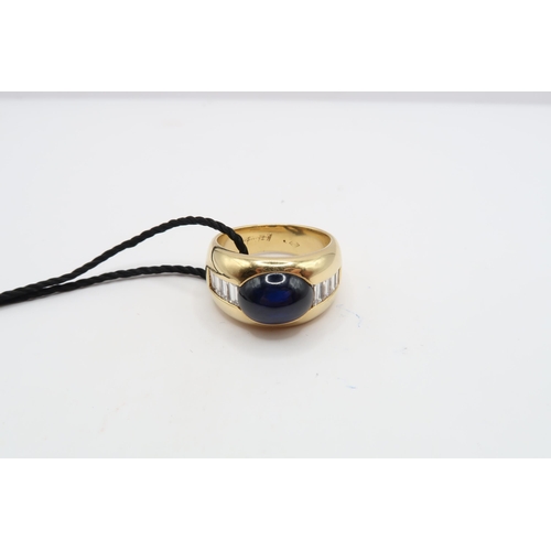 2 - An 18ct 'Kutchinsky' Cabochon Sapphire and Diamond ring. Condition: Head and shank in good order, In... 