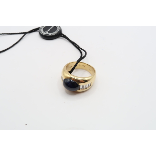 2 - An 18ct 'Kutchinsky' Cabochon Sapphire and Diamond ring. Condition: Head and shank in good order, In... 