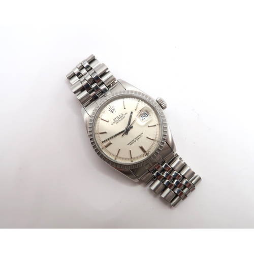 251 - A 1975, Rolex Oyster Perpetual Date Just, Reference 1604, 36mm. Featuring a stainless steel jubilee ... 