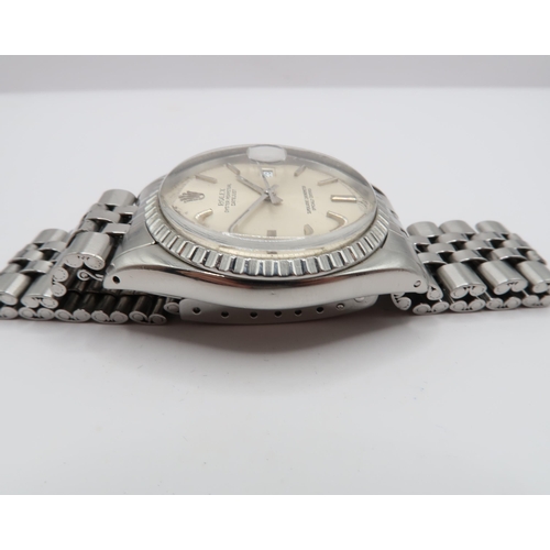 251 - A 1975, Rolex Oyster Perpetual Date Just, Reference 1604, 36mm. Featuring a stainless steel jubilee ... 